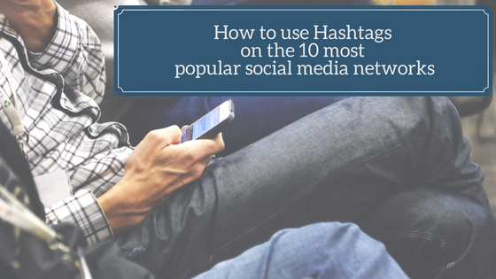 Man with phone, looking for insights and tips, how to use hashtags on the 10 most popular social media networks.